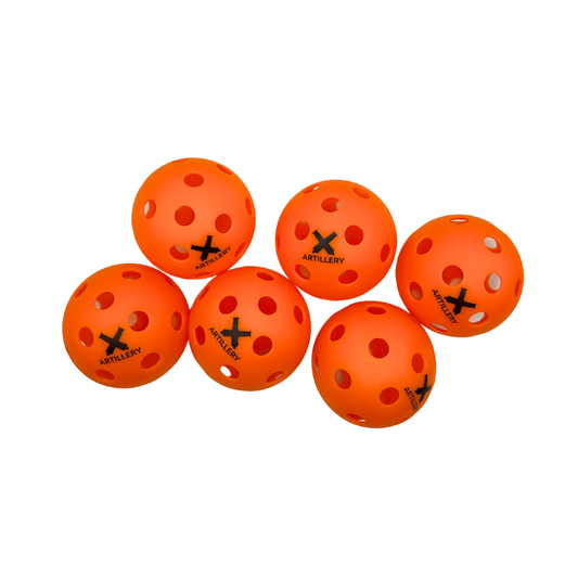 Carrier HE-1 Indoor Pickleballs - Six orange pickleballs arranged together
