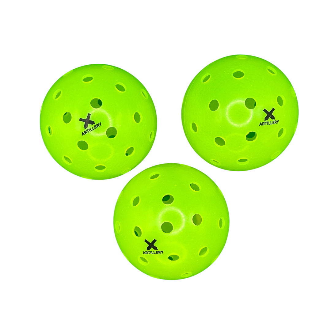 Three Artillery Sports outdoor pickleballs showing Artillery logo